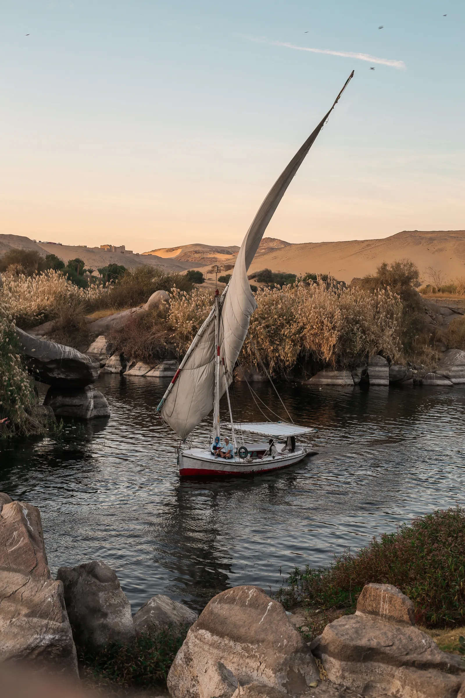 Felucca on the Nile at sunset during the 4 Night Nile Cruise from Luxor to Aswan