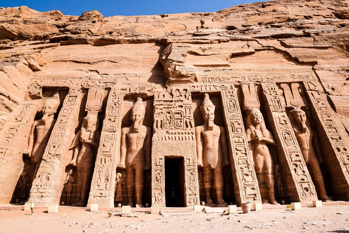 Luxor to Abu Simbel - colossal statues at the temple facade