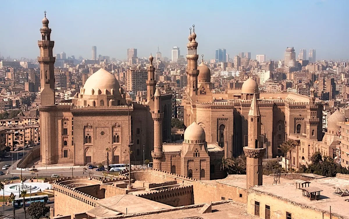 Cairo or Luxor - Cairo cityscape and pyramids