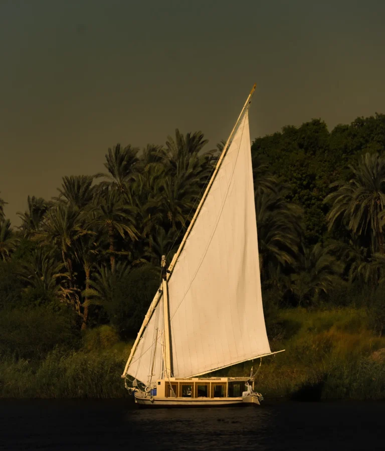 Traditional dahabiya sailing on the Nile between Aswan and Luxor