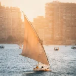 Dahabiya sailing on the Nile at sunset during the 3 nights cruise