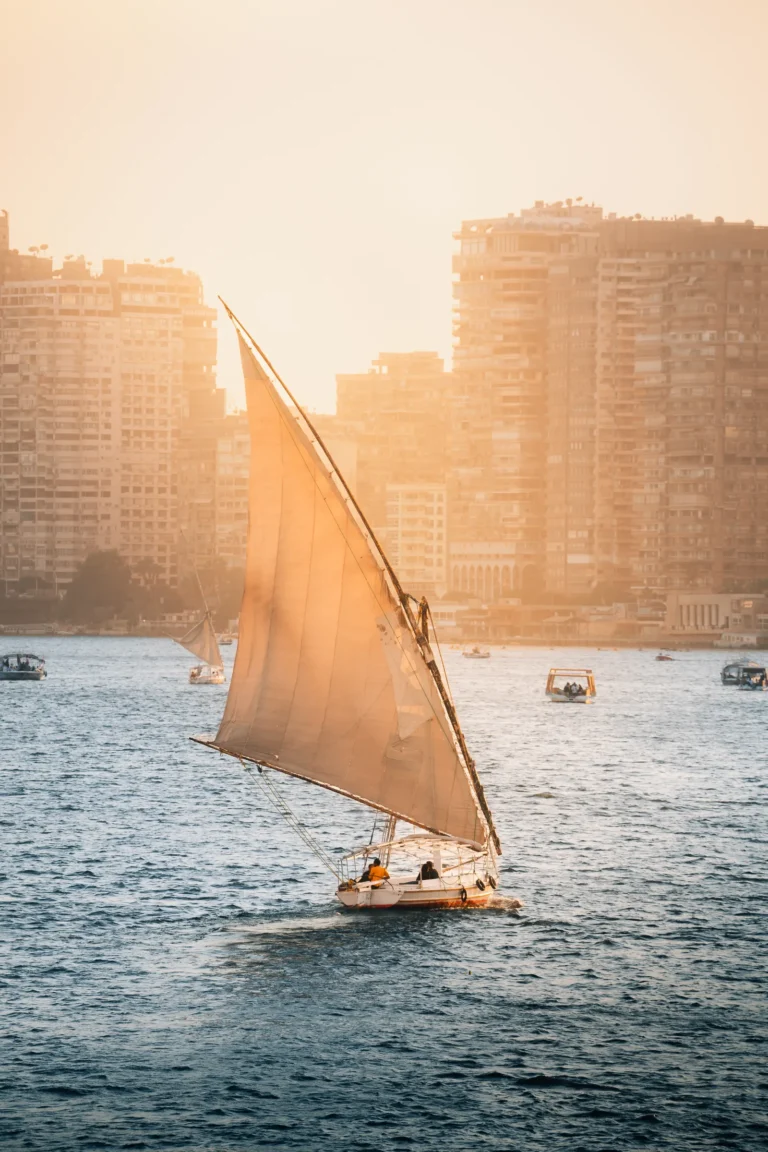 Dahabiya sailing on the Nile at sunset during the 3 nights cruise