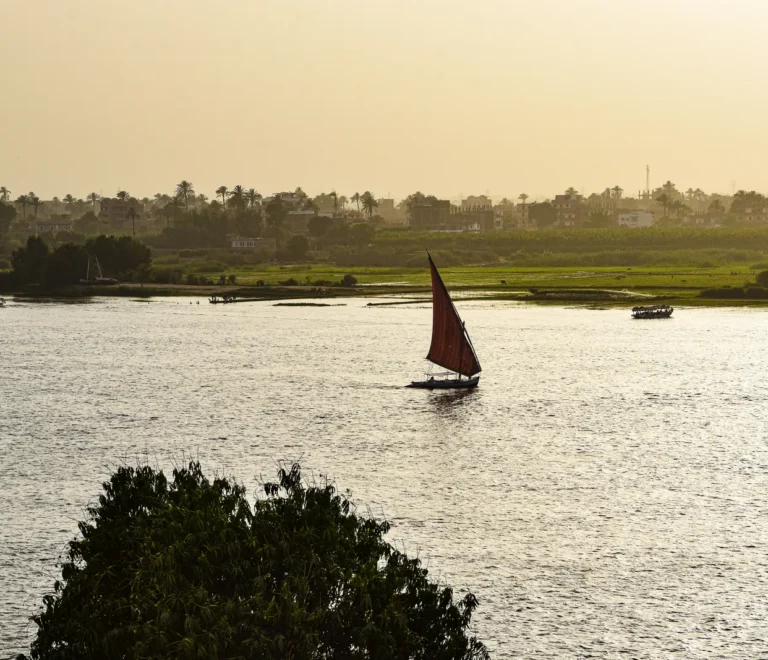 Felucca sailing on the Nile at sunset during the Nile cruise