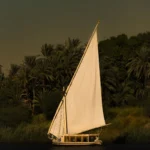 Felucca ride Aswan white sail on the Nile