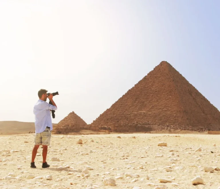 Is it safe to travel to Egypt - tourist enjoying the pyramids