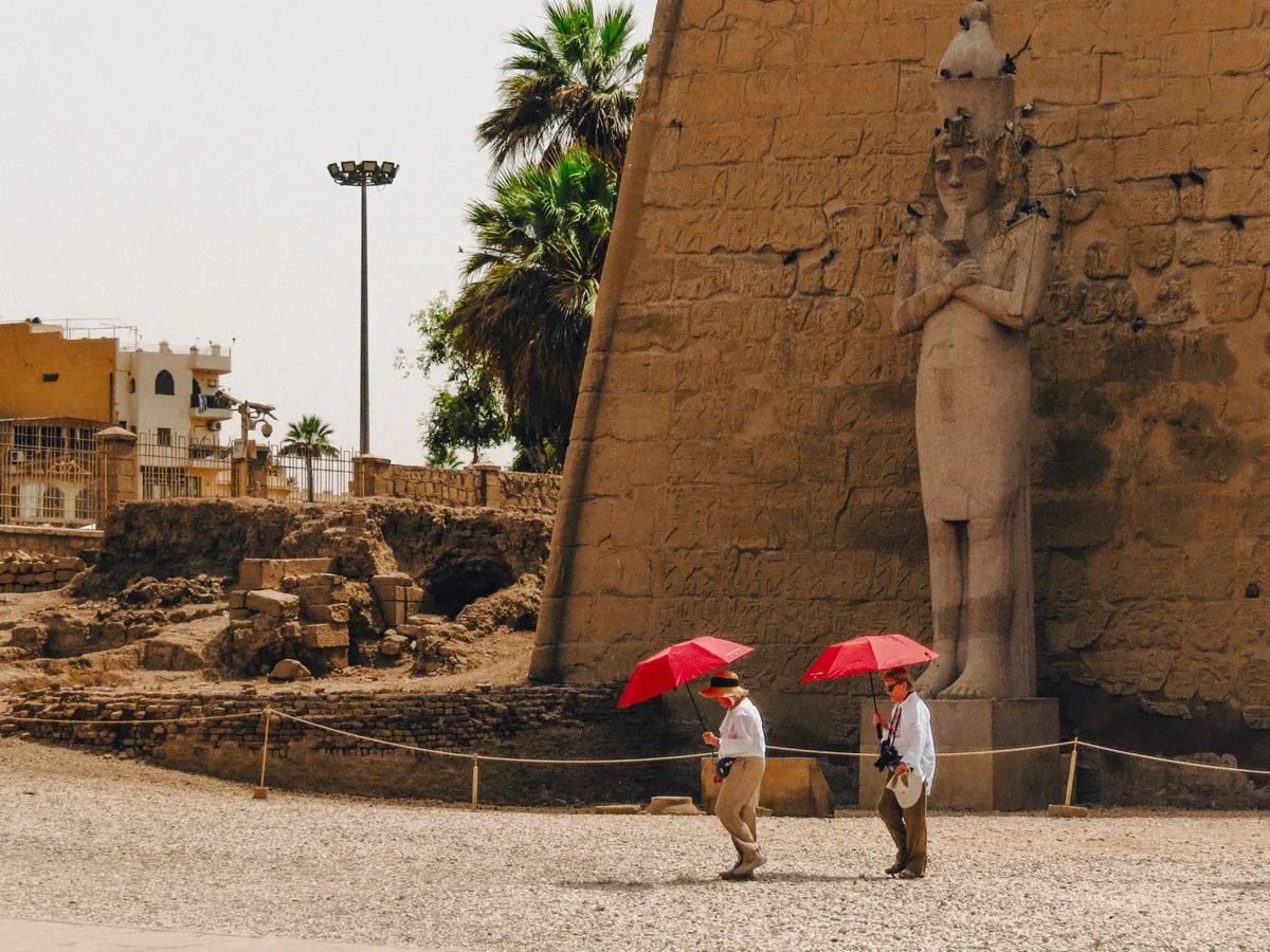Luxor itinerary - tourists exploring Luxor Temple