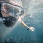 Snorkeling in Hurghada - snorkeler over a coral reef