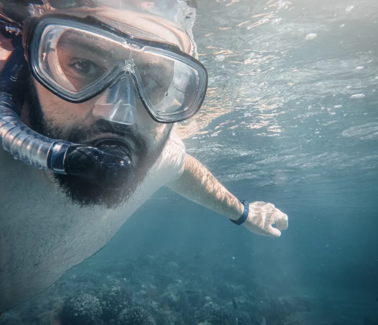 Snorkeling in Hurghada - snorkeler over a coral reef