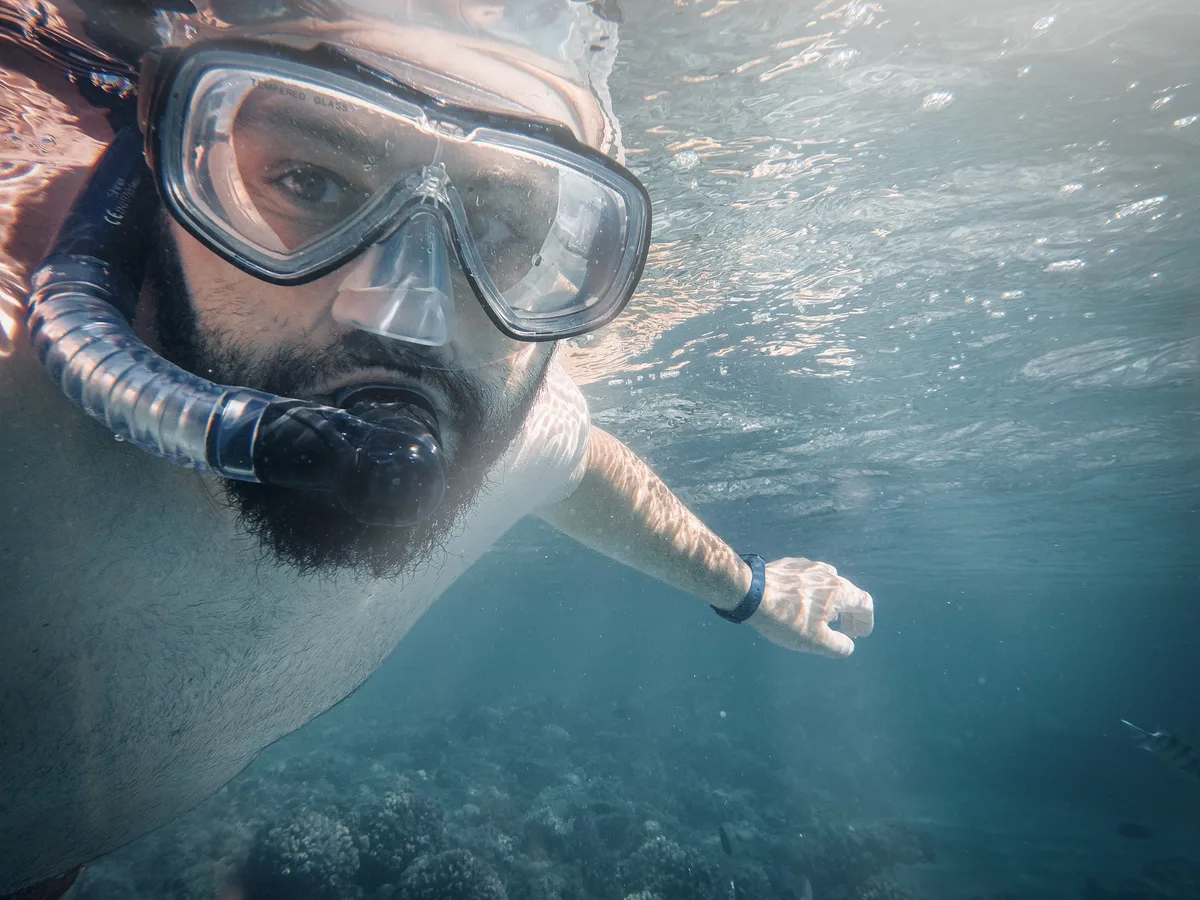 Snorkeling in Hurghada - snorkeler over a coral reef