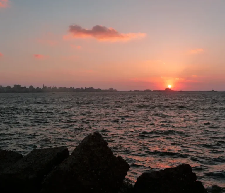 Sun setting over the Mediterranean at the Eastern Harbour in Alexandria, what is there to do in Alexandria