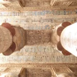 Painted ceiling and Hathor columns at Dendera Temple, home of the ancient Egyptian Dendera Zodiac