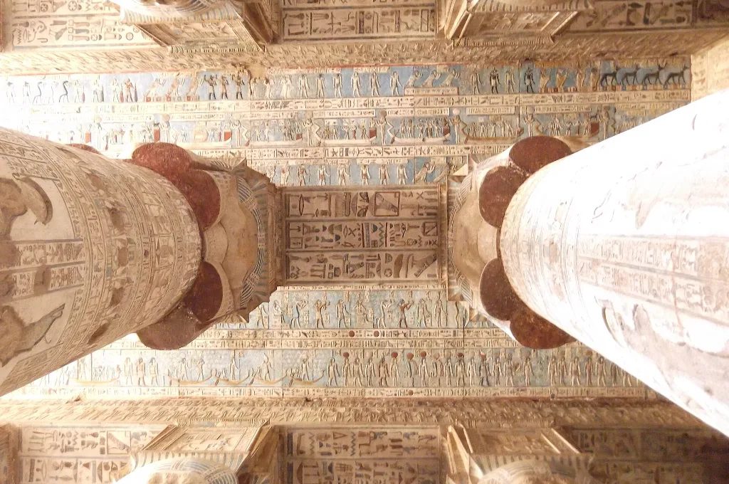 Painted ceiling and Hathor columns at Dendera Temple, home of the ancient Egyptian Dendera Zodiac