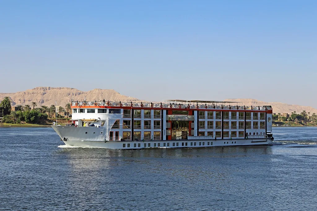 Nile cruise ship sailing past Luxor, one of the best Christmas vacations
