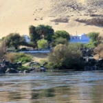 Nubian houses beside the Nile, a colorful stop on Christmas trips for families
