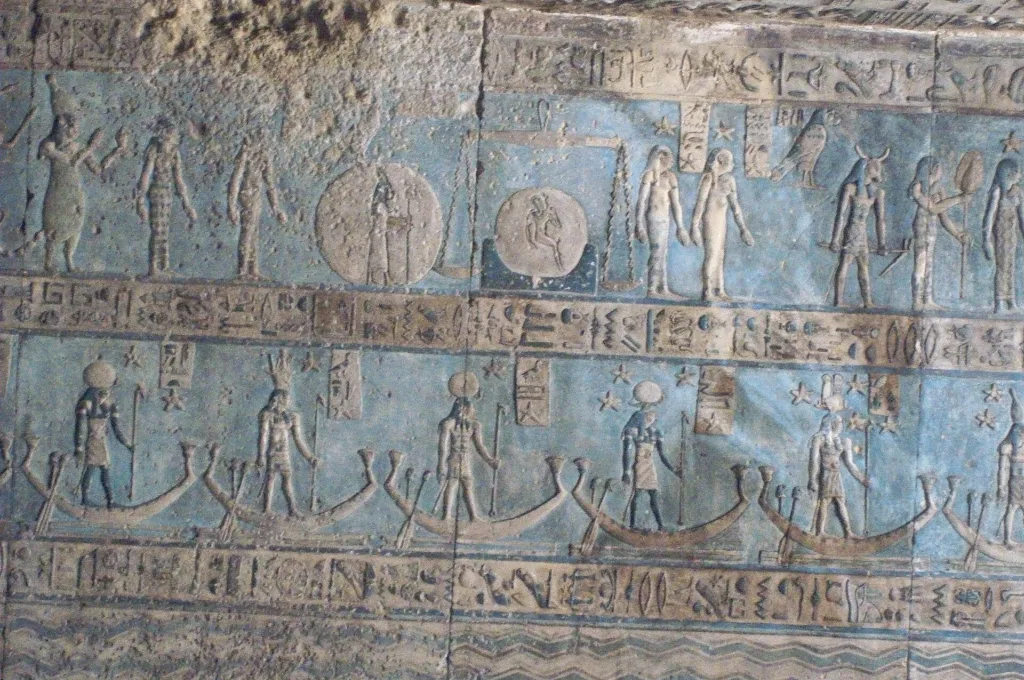 Blue astronomical ceiling with sky boats near the ancient Egyptian Dendera Zodiac at Dendera Temple