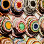 Egyptian traditional clothes: colourful handmade Nubian skullcaps on display in Aswan