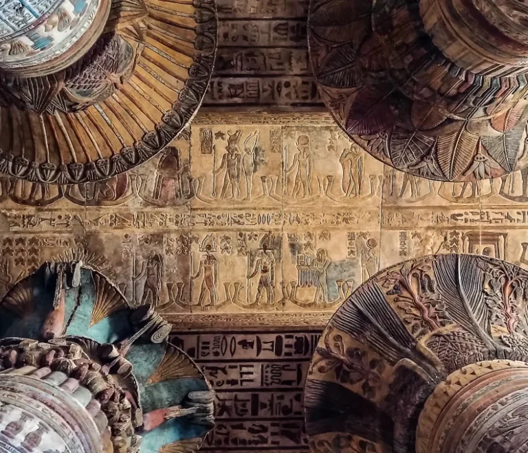 Painted ceiling and floral column capitals inside the Temple of Khnum, the highlight of Esna temple Egypt