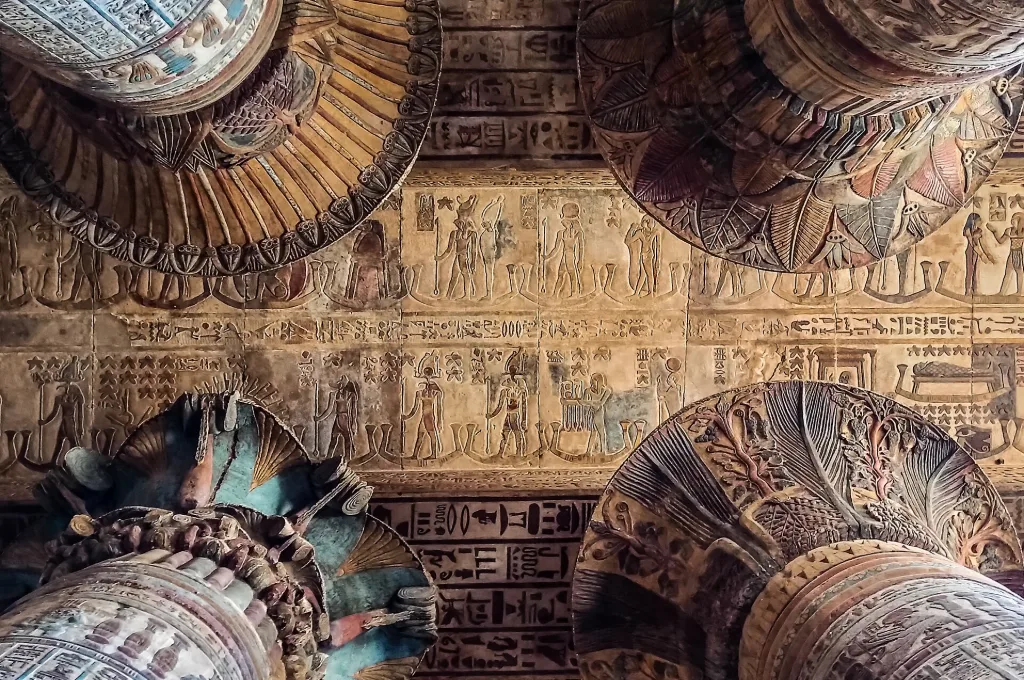 Painted ceiling and floral column capitals inside the Temple of Khnum, the highlight of Esna temple Egypt