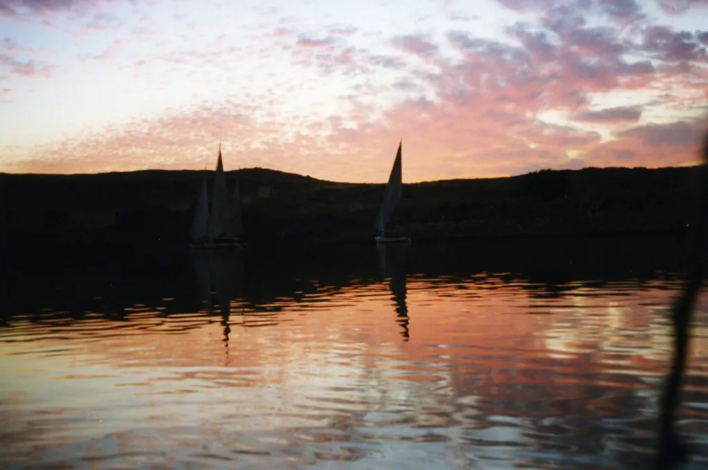 Felucca sailing the Nile at sunset in Egypt -New Year In Ancient Egypt