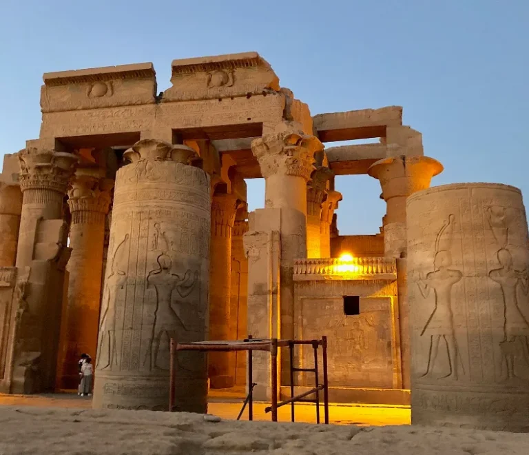 Kom Ombo Temple columns glowing at dusk beside the Nile