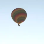 Sunrise hot air balloon ride lifting off over Luxor