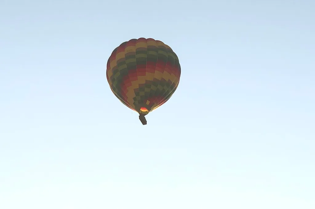Sunrise hot air balloon ride lifting off over Luxor