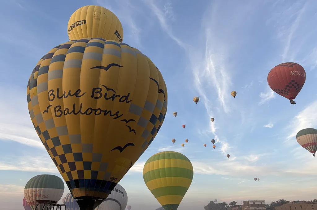 Calm mid-flight moment on a hot air balloon Luxor morning