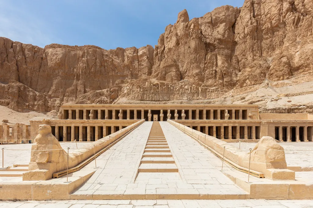 Hatshepsut Temple terraces under cliffs, a calm sight for New Year in Luxor