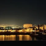 Luxor lights reflected on the Nile at night, the setting for New Year in Luxor