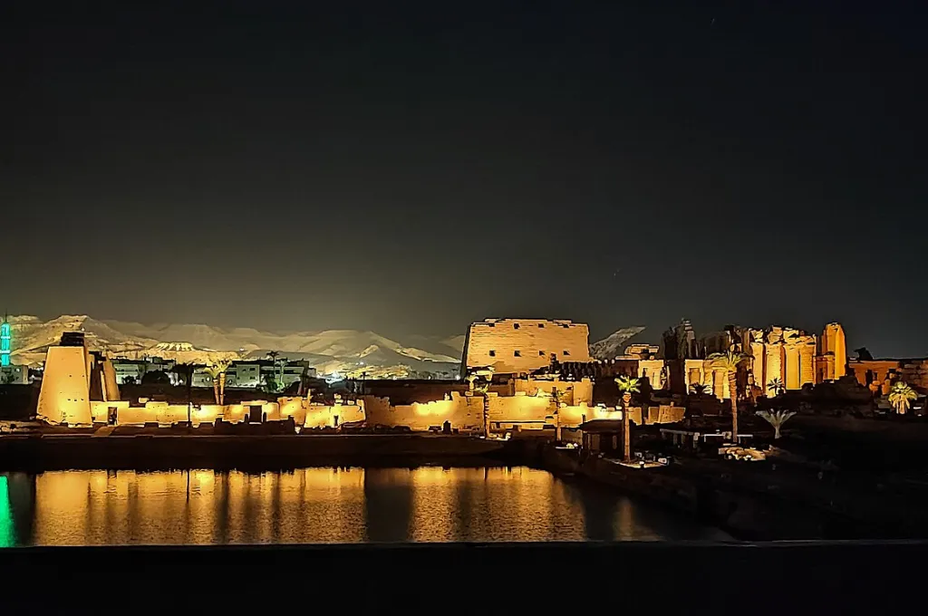 Luxor lights reflected on the Nile at night, the setting for New Year in Luxor