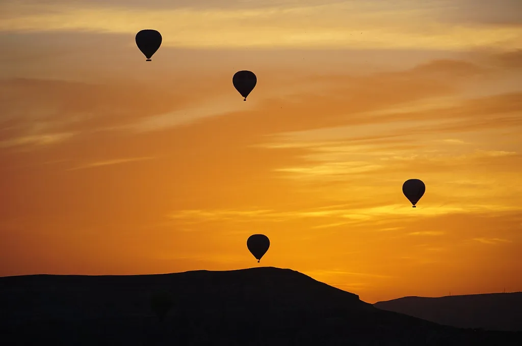 Turkish hot air balloon sky above Cappadocia valleys